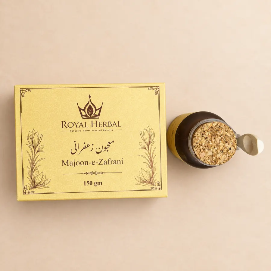 The Majoon-e-Zafrani box beside a dish of the herb, nut and saffron blend it is made from